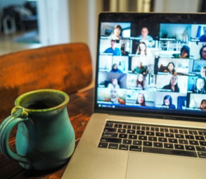 macbook pro displaying group of people